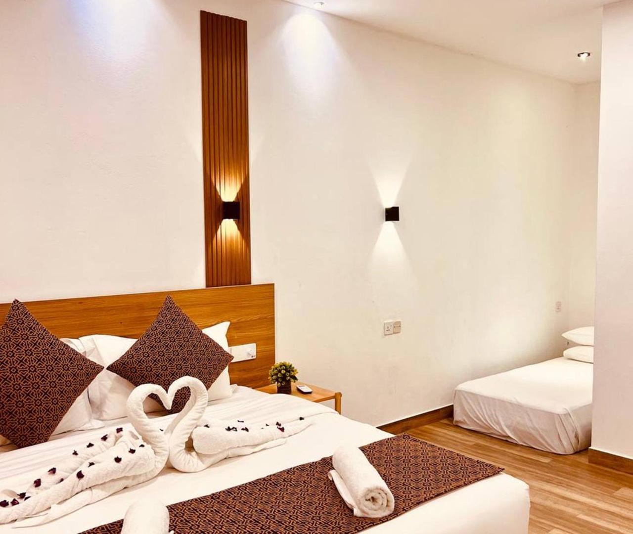 Kihaa Holiday Home Finolhu Bagian luar foto